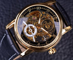Load image into Gallery viewer, Forsining Engraving Skeleton Gear Watch men This watch has a high-quality skeleton look that draws attention to any face, and its metal body makes it suitable for casual and dressy outfits. You can match it with a suit, but its unique look makes it the accessory you want to own this season!
