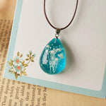 Load image into Gallery viewer, Dried Flowers Necklace Necklace, Women Enjoy a piece of the outdoors alive at your very neck. This flower in a necklace has been specially picked and dried before being pressed in clear blue glass pendant, reminiscing the outdoors out of doors without having to leave your home.
