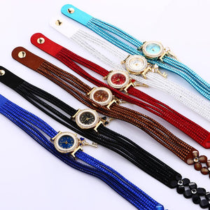 Key and Flowers Bracelet Watch Women This watch has all the best elements of the past, present and future. The modern, easy to read watch features a key hanging off the side and a attached flower design bracelet. You can tell time in an easy and efficient manner with this easy to read watch.