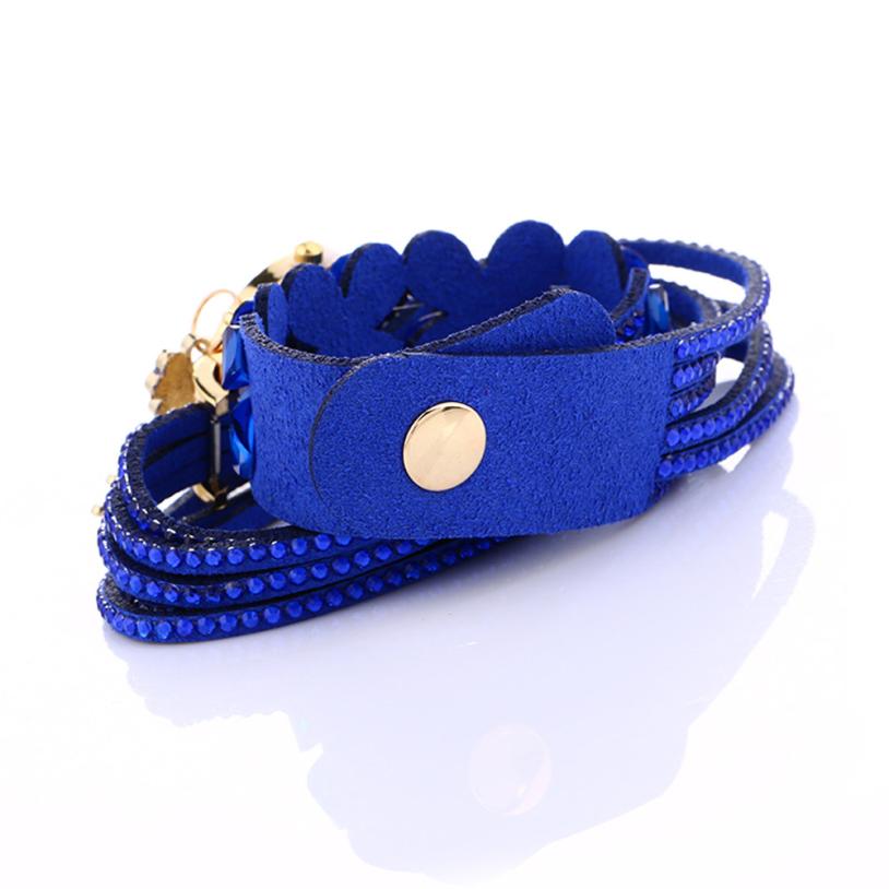 Key and Flowers Bracelet Watch Women This watch has all the best elements of the past, present and future. The modern, easy to read watch features a key hanging off the side and a attached flower design bracelet. You can tell time in an easy and efficient manner with this easy to read watch.