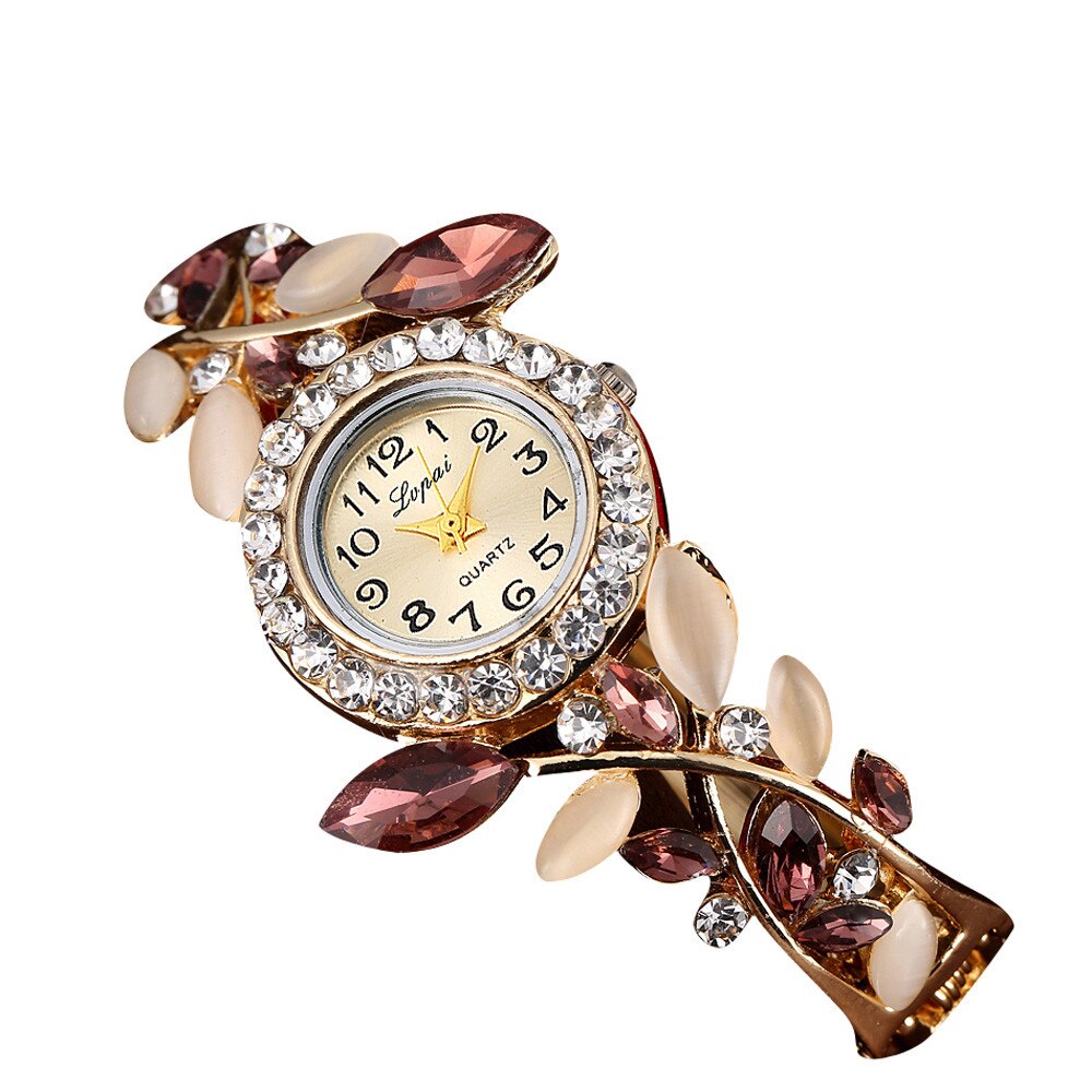 Crystal Leaf Bracelet Watch Women Fresh in your garden of time, this Crystal Leafs Bracelet Watch tells you every chapter of the story without skipping the pages. An array of dangling crystals and very pretty face designed exclusively for women go a long way into making your timetelling experience better than it already is.