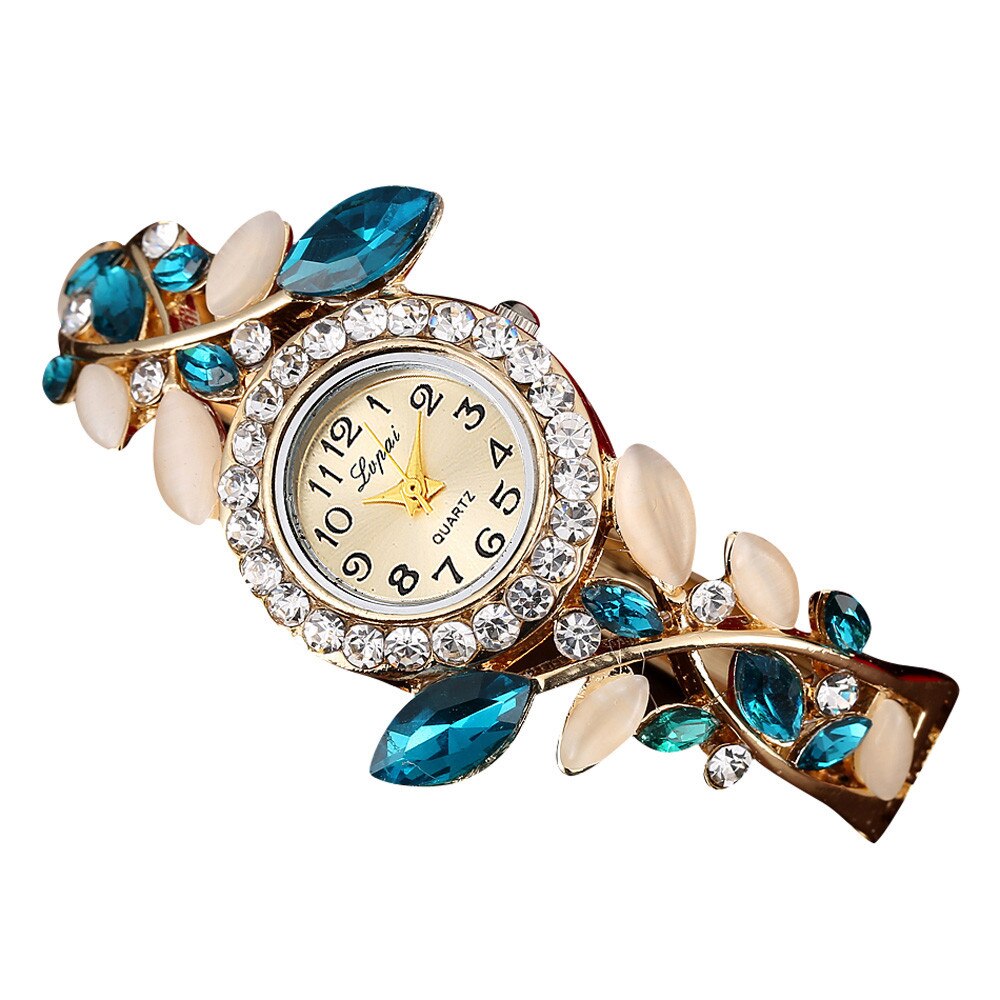 Crystal Leaf Bracelet Watch Women Fresh in your garden of time, this Crystal Leafs Bracelet Watch tells you every chapter of the story without skipping the pages. An array of dangling crystals and very pretty face designed exclusively for women go a long way into making your timetelling experience better than it already is.