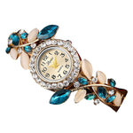 Load image into Gallery viewer, Crystal Leaf Bracelet Watch Women Fresh in your garden of time, this Crystal Leafs Bracelet Watch tells you every chapter of the story without skipping the pages. An array of dangling crystals and very pretty face designed exclusively for women go a long way into making your timetelling experience better than it already is.
