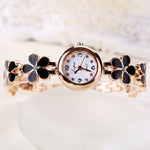 Load image into Gallery viewer, Flowers Watch Bracelet Women Money is the last thing on your mind when you&#39;re surrounded by flowers. Try spending time and enjoying the warmth of summer -time in the countryside, listening to the birds twittering. You&#39;ll forget the worries of the world. Feel that sense of peace and tranquility again. Now you can add that feeling to your watch collection with the eprolo Flowers Watch Bracelet. Made of highly durable stainless steel and featuring a gorgeous design, this watch is a match with any outfit.
